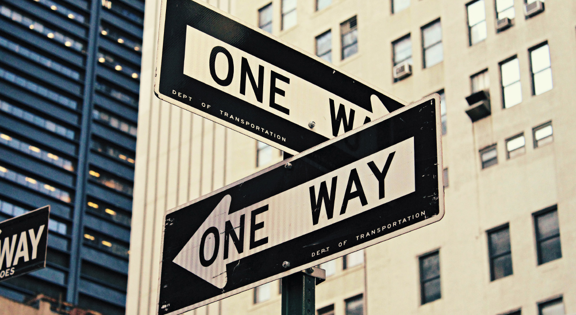 One way signs pointing in different directions